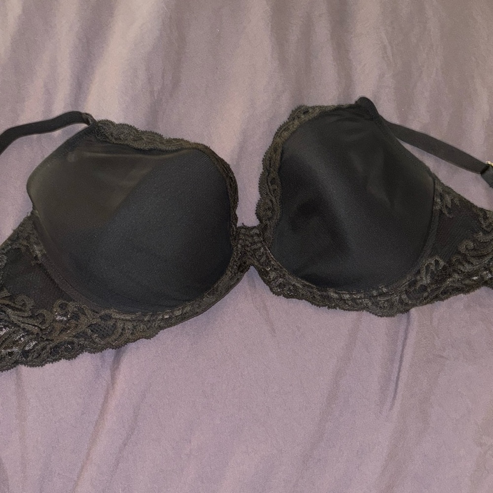 Like new. Worn only a couple of times. Natori bra in dark gray.
